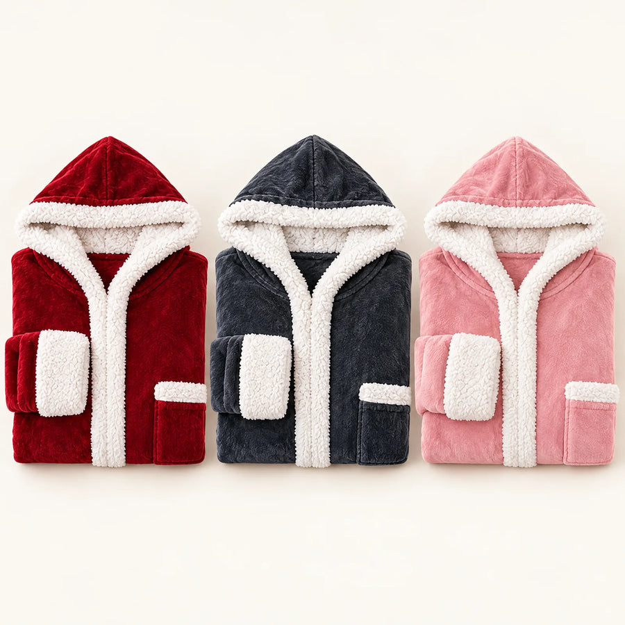 Three folded hooded heated blankets in burgundy, charcoal and pink